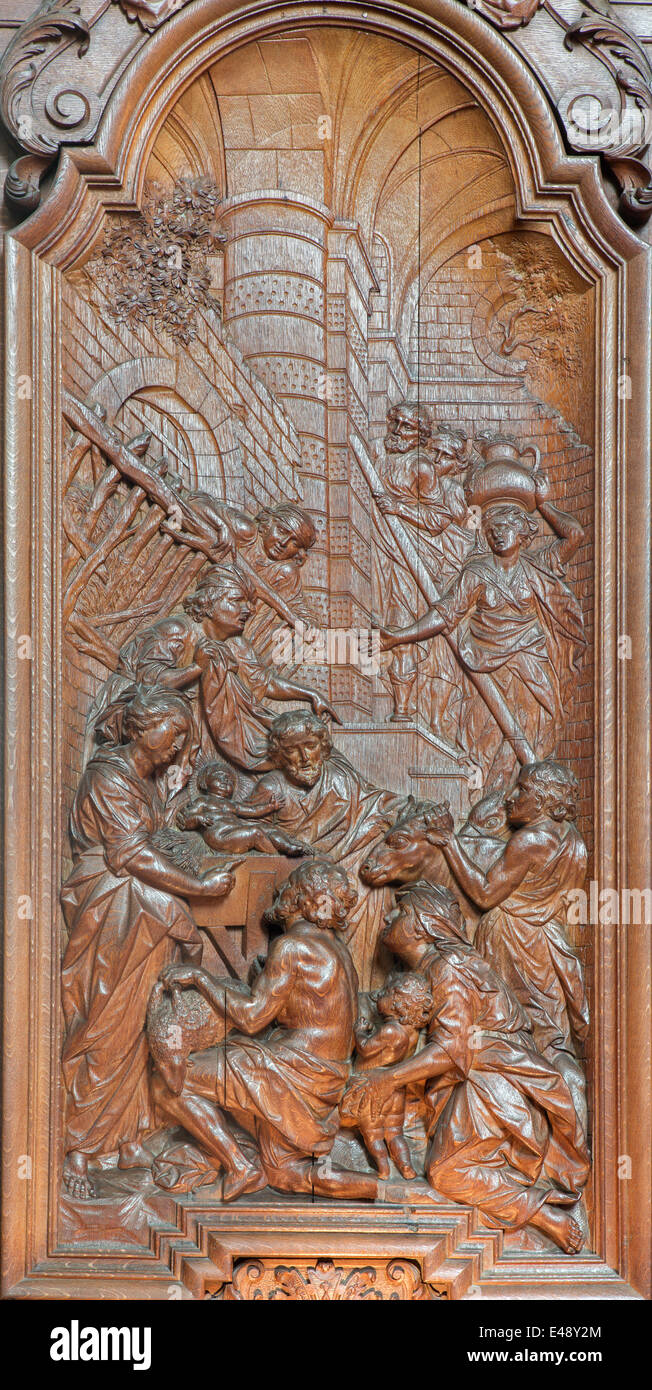 Mechelen - The carving of Nativity scene by Ferdinand Wijnants in st. Johns church or Janskerk from begin of 20. cent. Stock Photo
