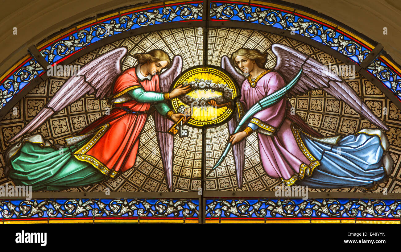 BRUSSELS, BELGIUM - JUNE 15, 2014: The Angels from windowpane in St. Jacques Church at The Coudenberg. Stock Photo