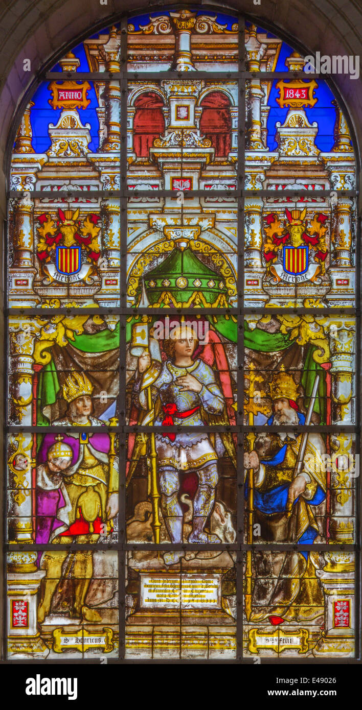 Brussels - Stained glass window depicting  Archangel Gabriel in the center (1843) in  cathedral of st. Michael and st. Gudula. Stock Photo