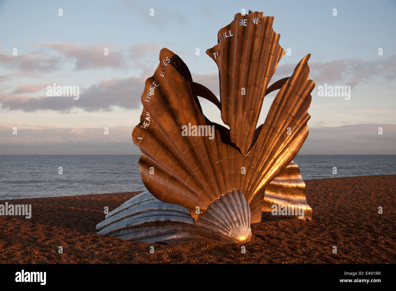 Maggi Hambling's steel sculpture, 'Scallop' on Aldeburgh beach at sunset Stock Photo