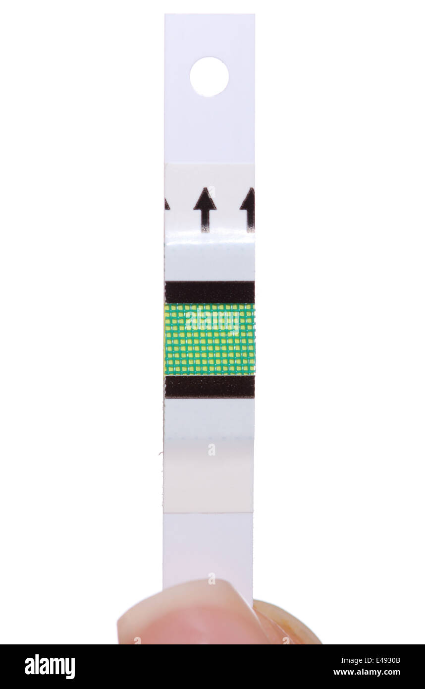 Closeup of strip for glucose testing, measuring sugar level. Isolated