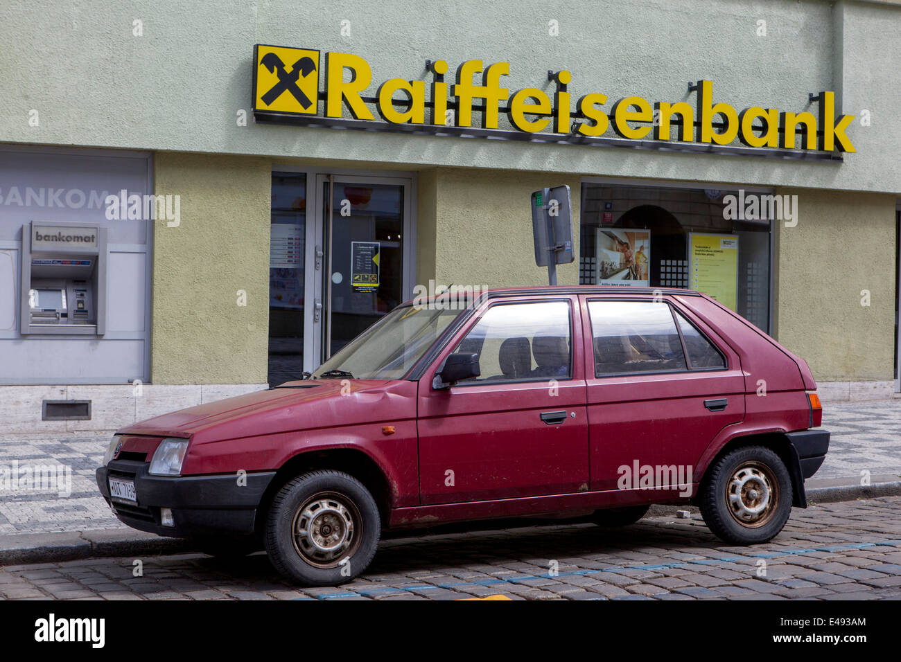 Old car Skoda favorit front of Raiffaisenbank Prague, Czech Republic Stock Photo