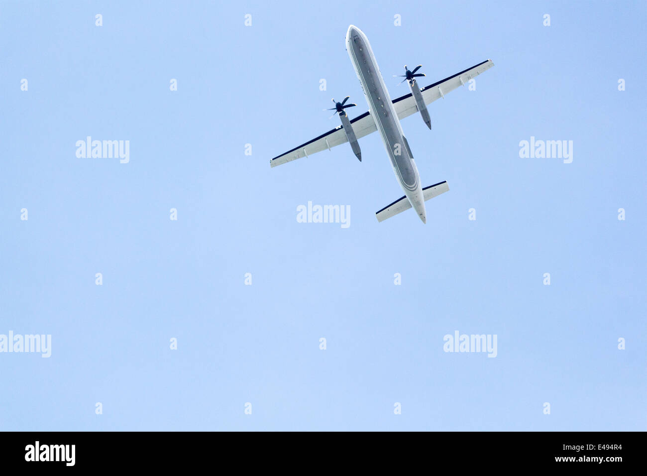 Porter airlines Bombardier Q400 aircraft underside view taking off from Billy Bishop Airport in Toronto Ontario Stock Photo