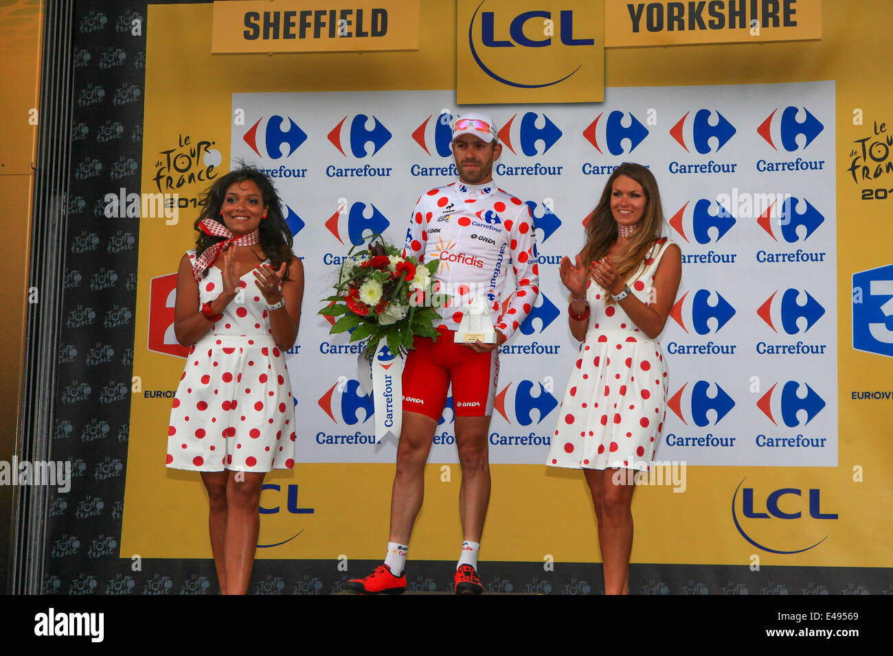 York, Sheffield, UK. 06th July, 2014. Tour De France Stage 2. Cyril Lemoine (Cofidis) on the podium to collect the trophy as leader of the King of the Mountains competition Credit:  Action Plus Sports/Alamy Live News Stock Photo