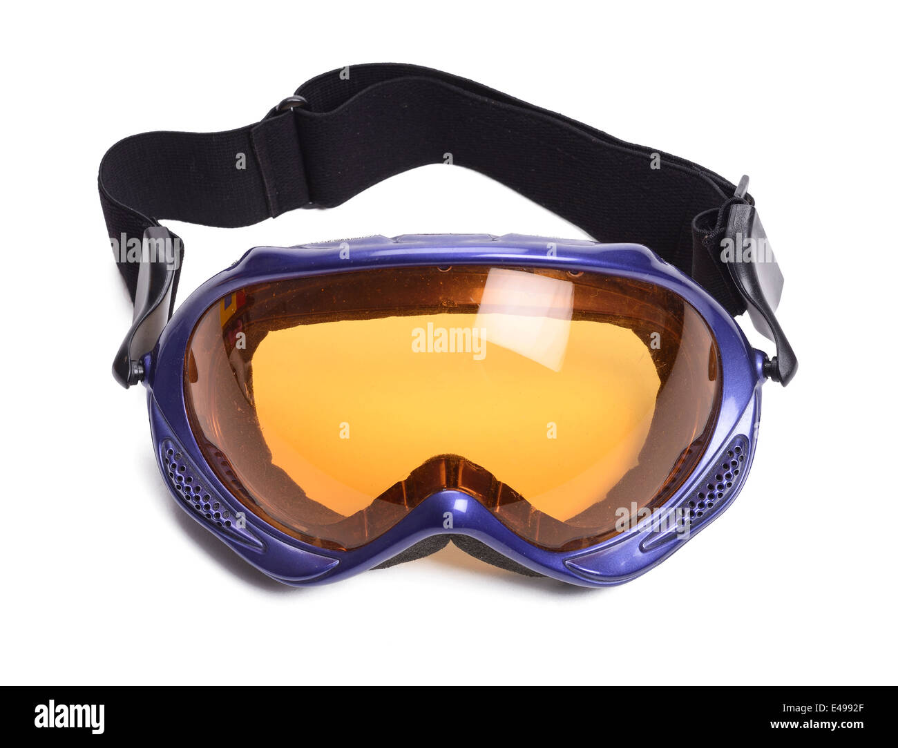 Ski goggles with an orange tinted lens Stock Photo