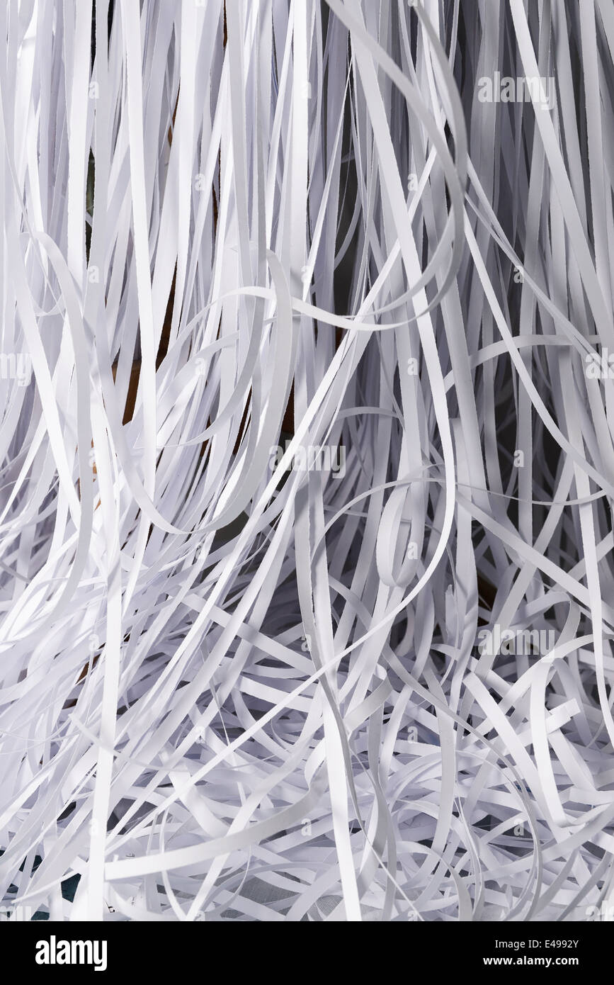 Strands of white shredded paper Stock Photo