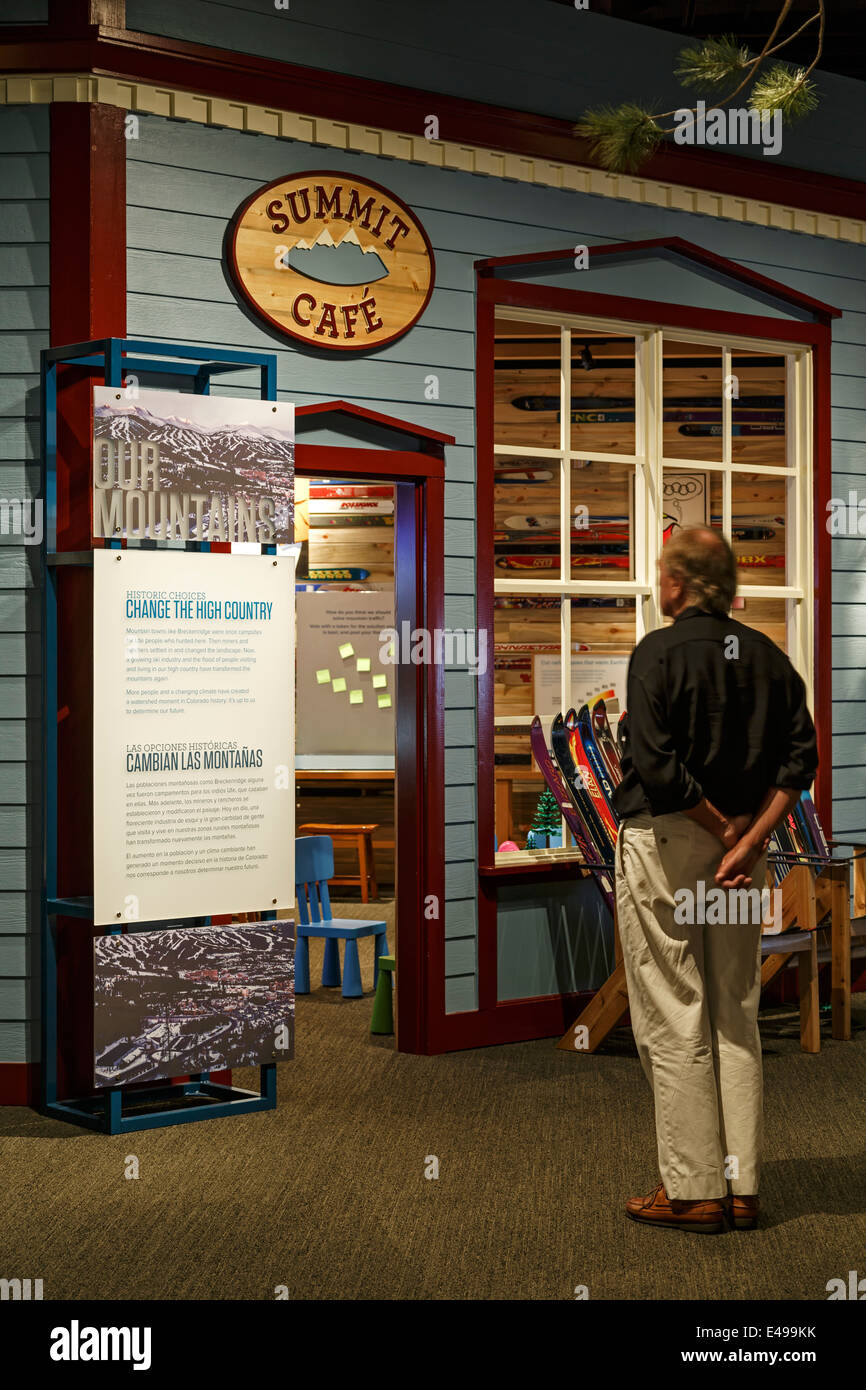 Man admiring 'Summit Cafe', Living West Exhibit, History Colorado Center (museum), Denver, Colorado USA Stock Photo