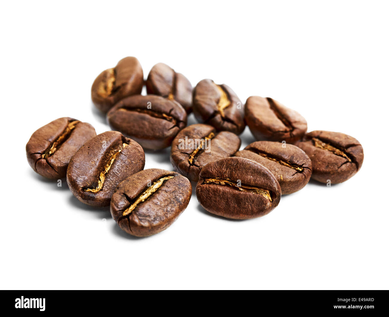 Brown coffee beans isolated on white background Stock Photo - Alamy