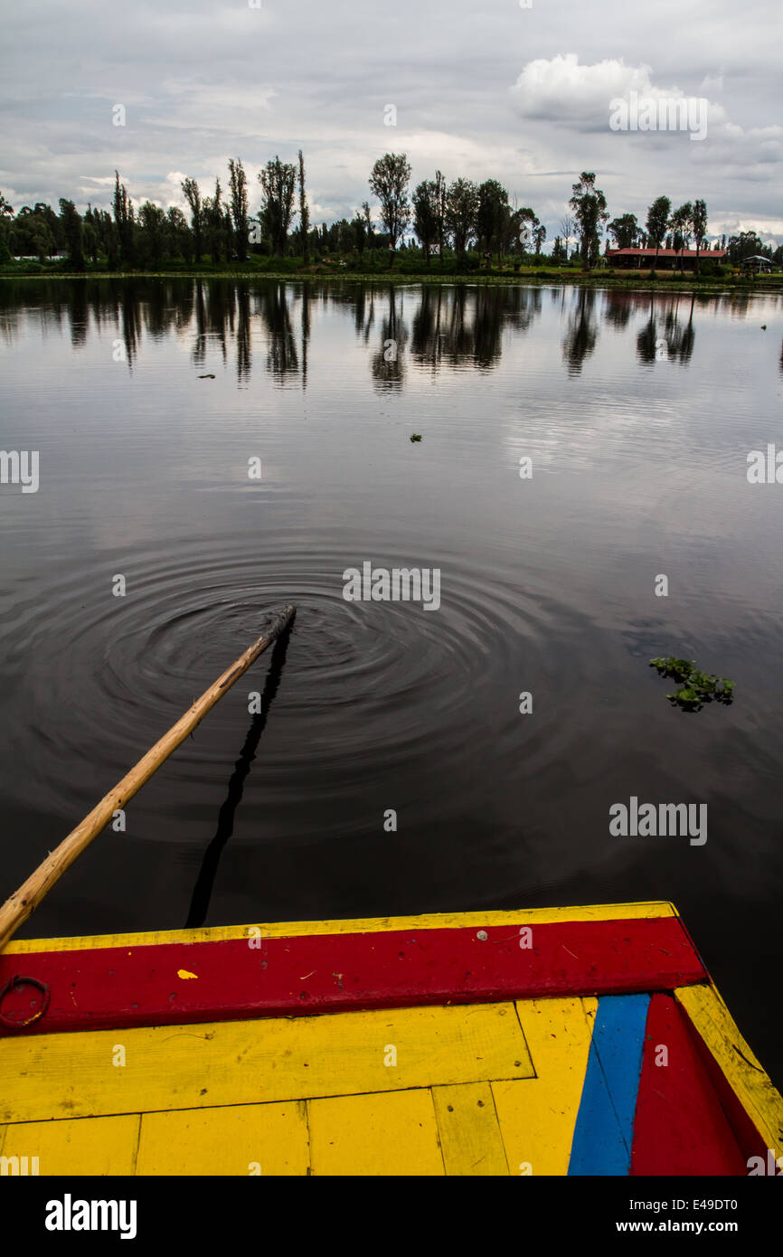 Siling the trajineras boat in traditional xochimilco town in the outskirts of mexico city Stock Photo
