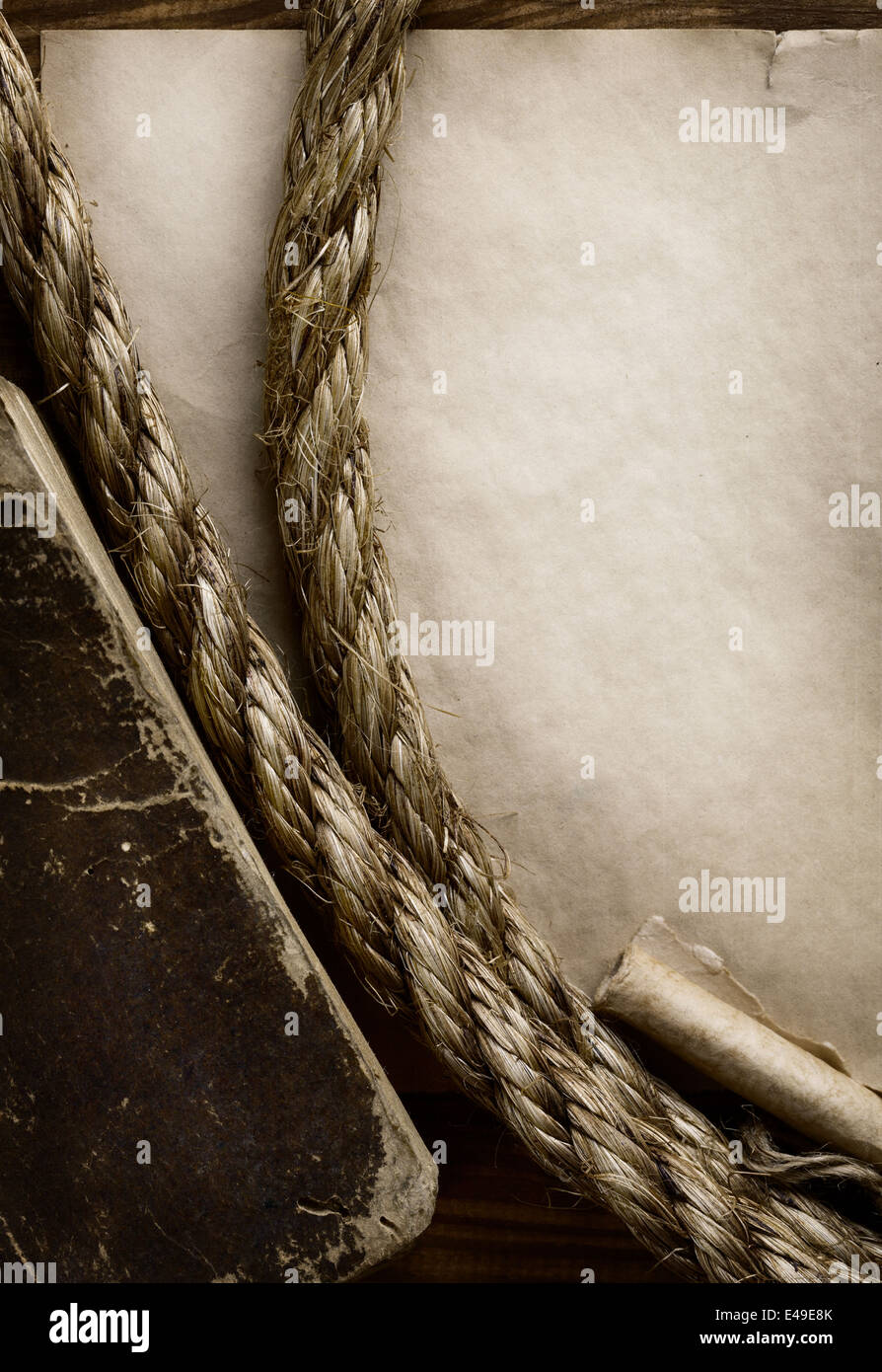 aged Rope on the old paper background Stock Photo - Alamy