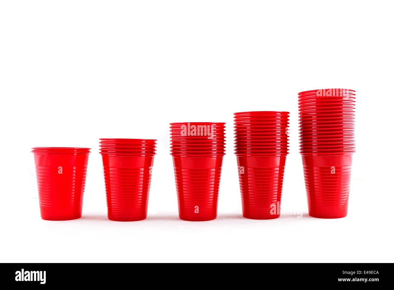 Plastic red cups stacks isolated on white background Stock Photo Alamy