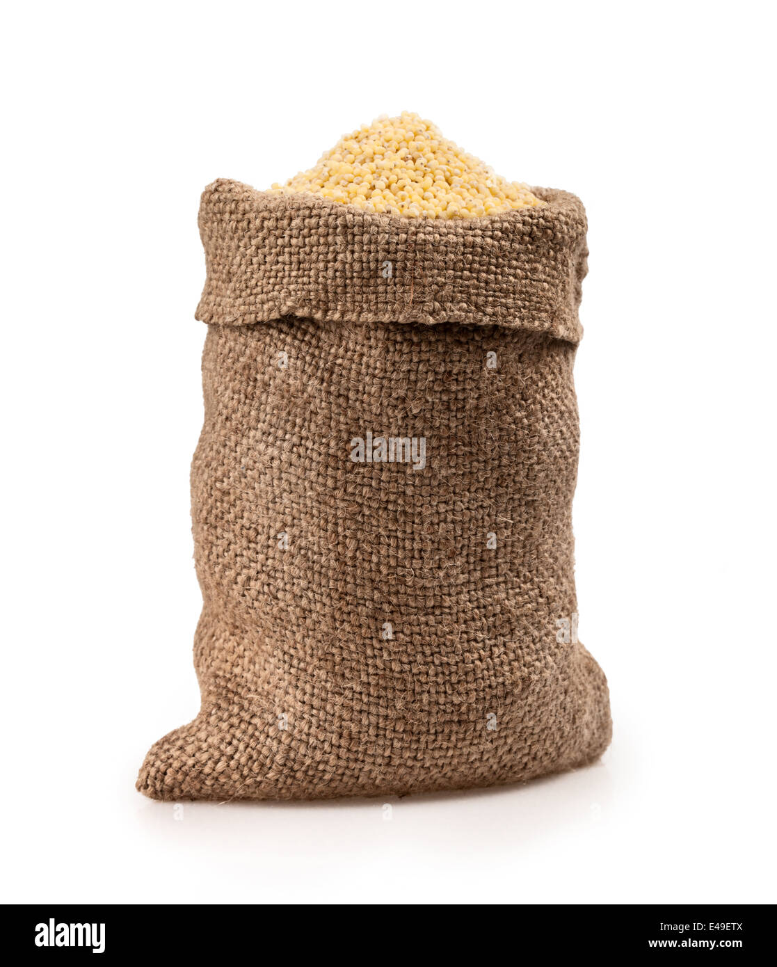 bag of millet on a white background Stock Photo