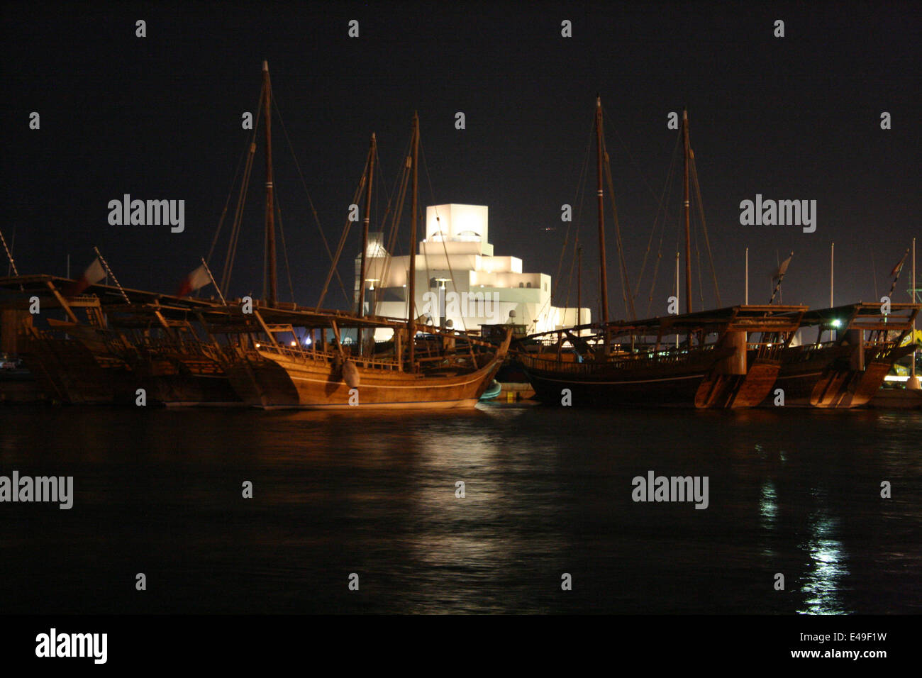 Dhow harbour at night, Doha, Qatar Stock Photo