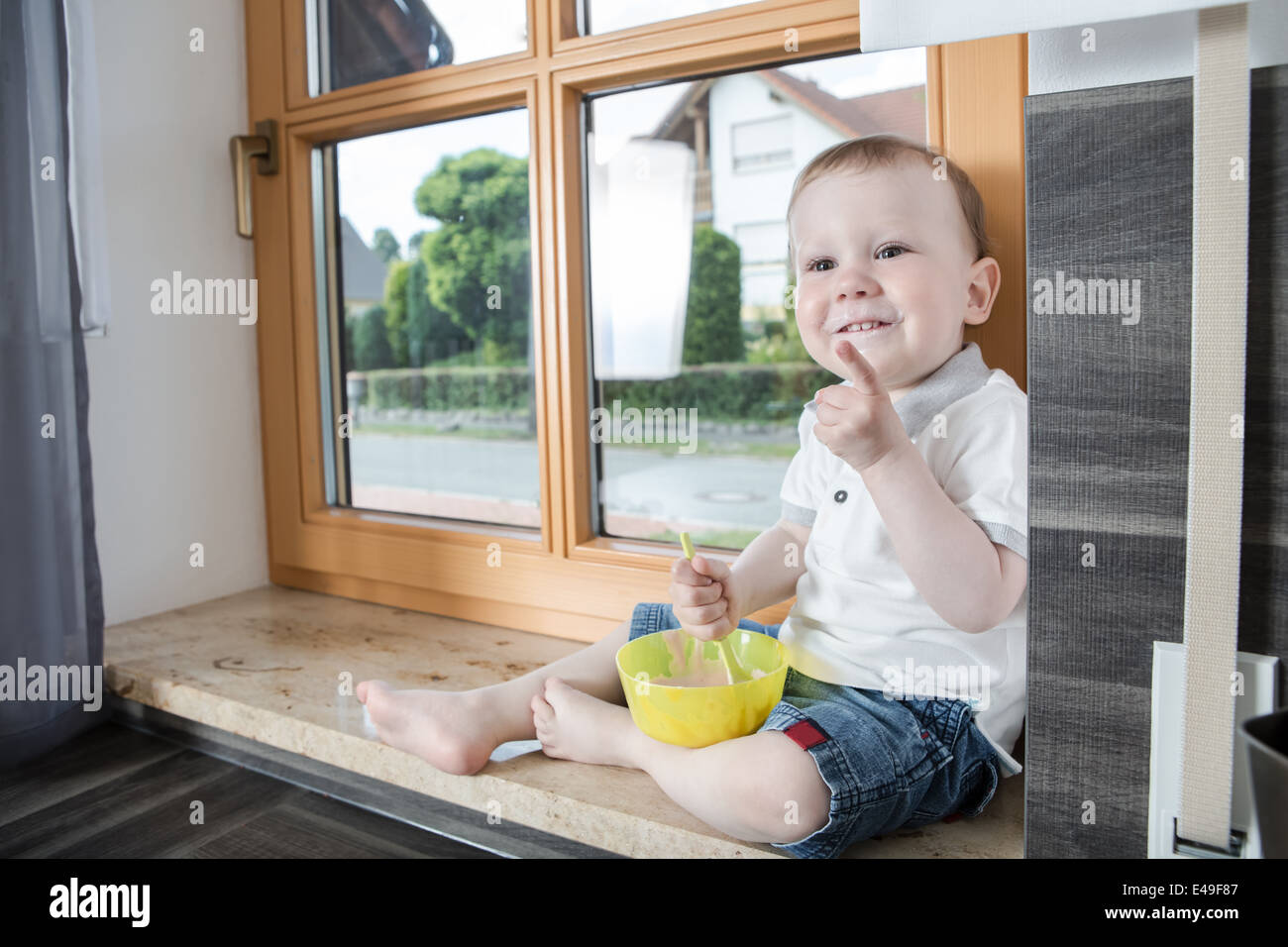 a 1,5 years old boy in the kitchen Stock Photo Alamy