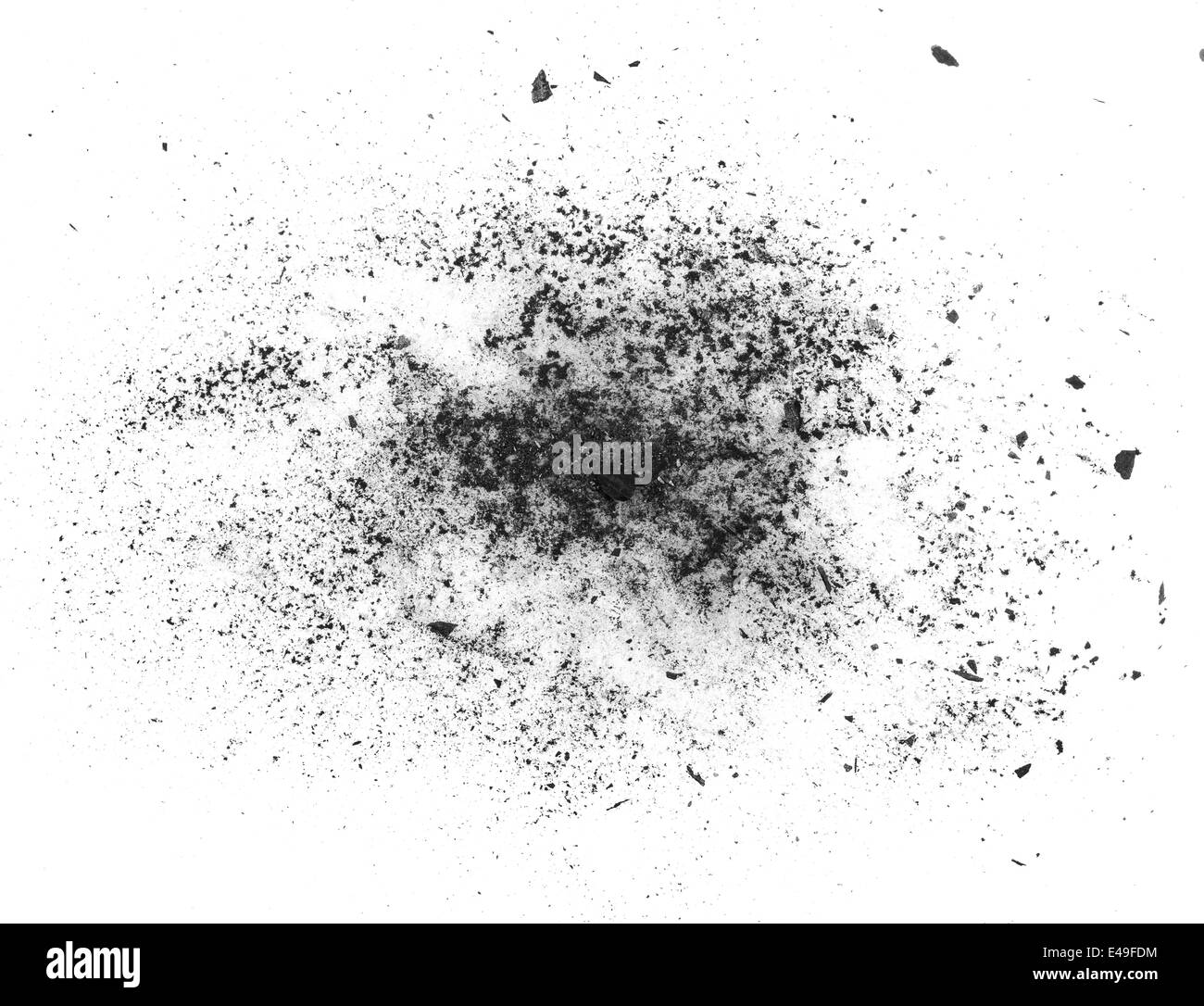 particles of charcoal on a white background Stock Photo