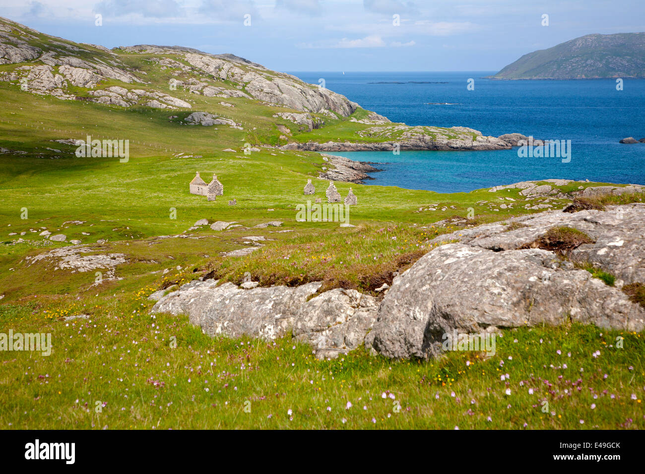 Ruined h ouses in abandoned village of Eorasdail on Vatersay, Isle of Barra, Outer Hebrides, Scotland Stock Photo