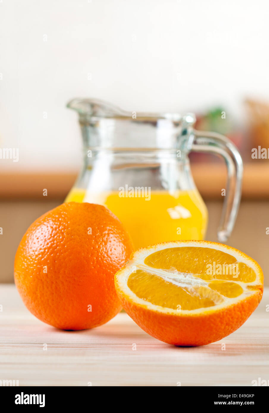 Oranges with a jug of juice Stock Photo