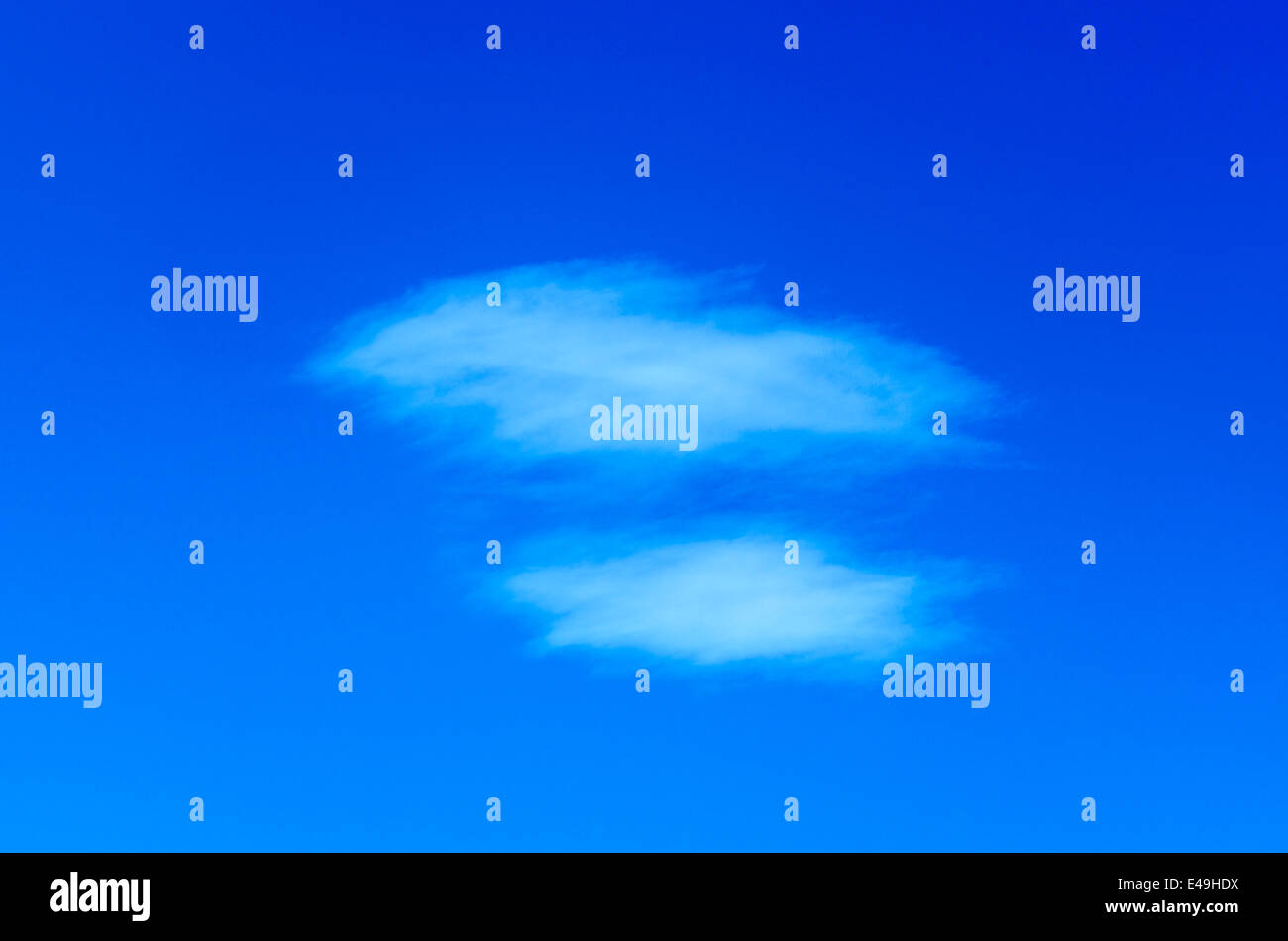 Clouds in a beautiful blue sky Stock Photo - Alamy