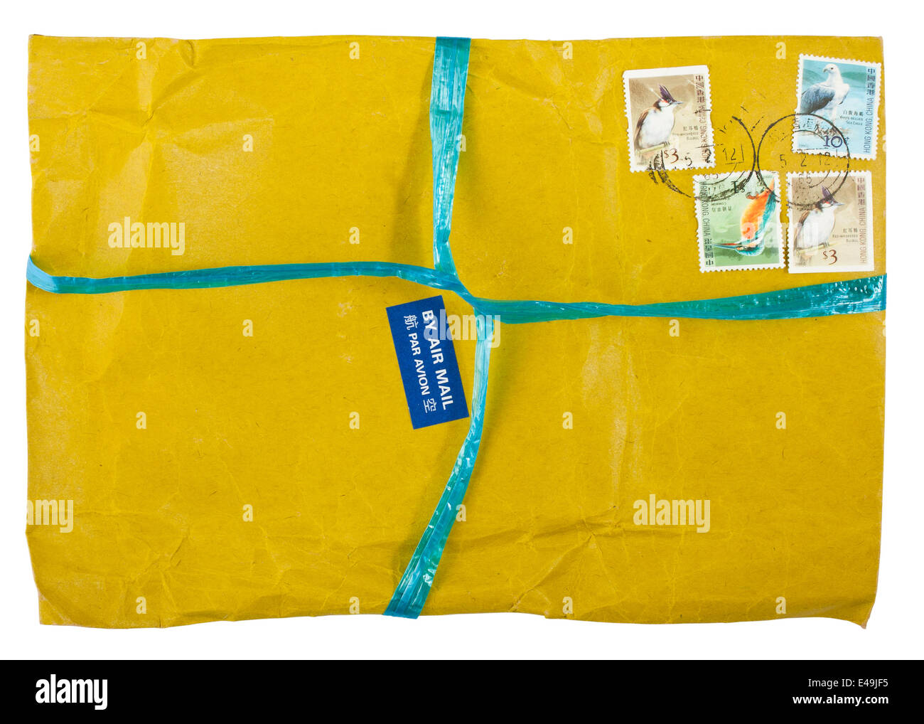 Vintage yellow envelope with stamps Stock Photo Alamy