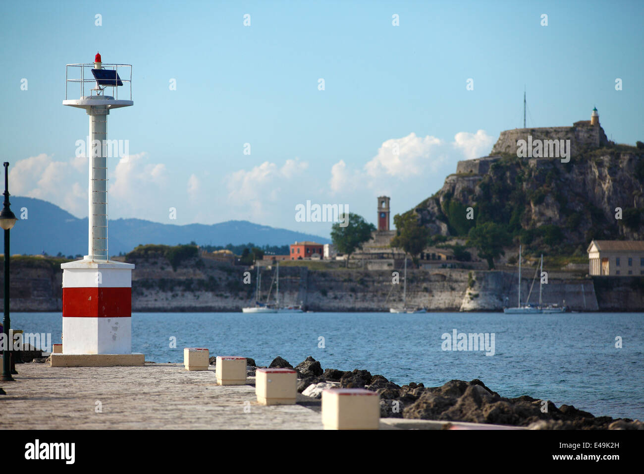 Greece, Ionic Islands, Corfu, harbour light at Garitsa bay Stock Photo