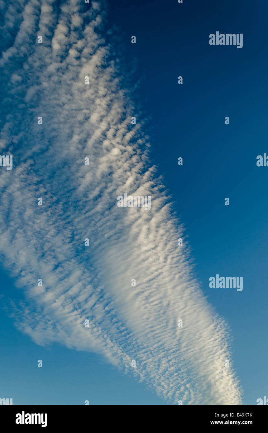 Clouds in a beautiful blue sky Stock Photo - Alamy