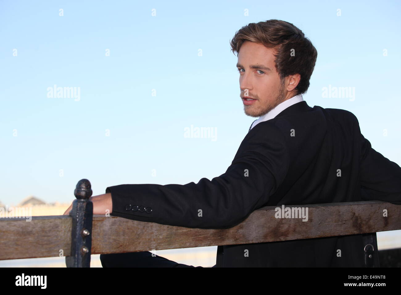 Black man and a white man on a bench hi-res stock photography and ...