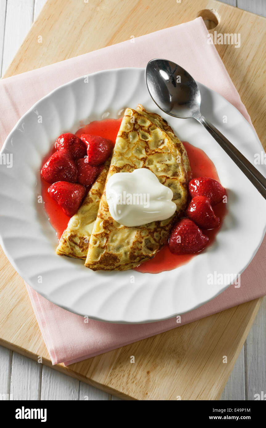 Strawberry pancakes with cream Stock Photo