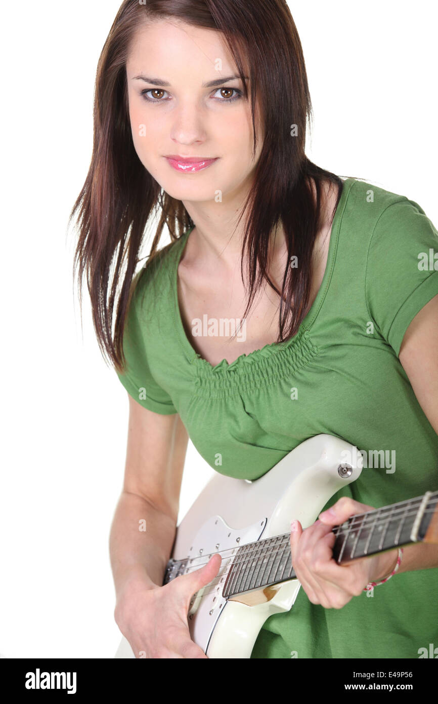 Young woman playing the electric guitar Stock Photo Alamy