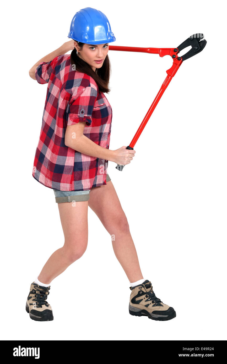 Young woman with bolt cutters Stock Photo