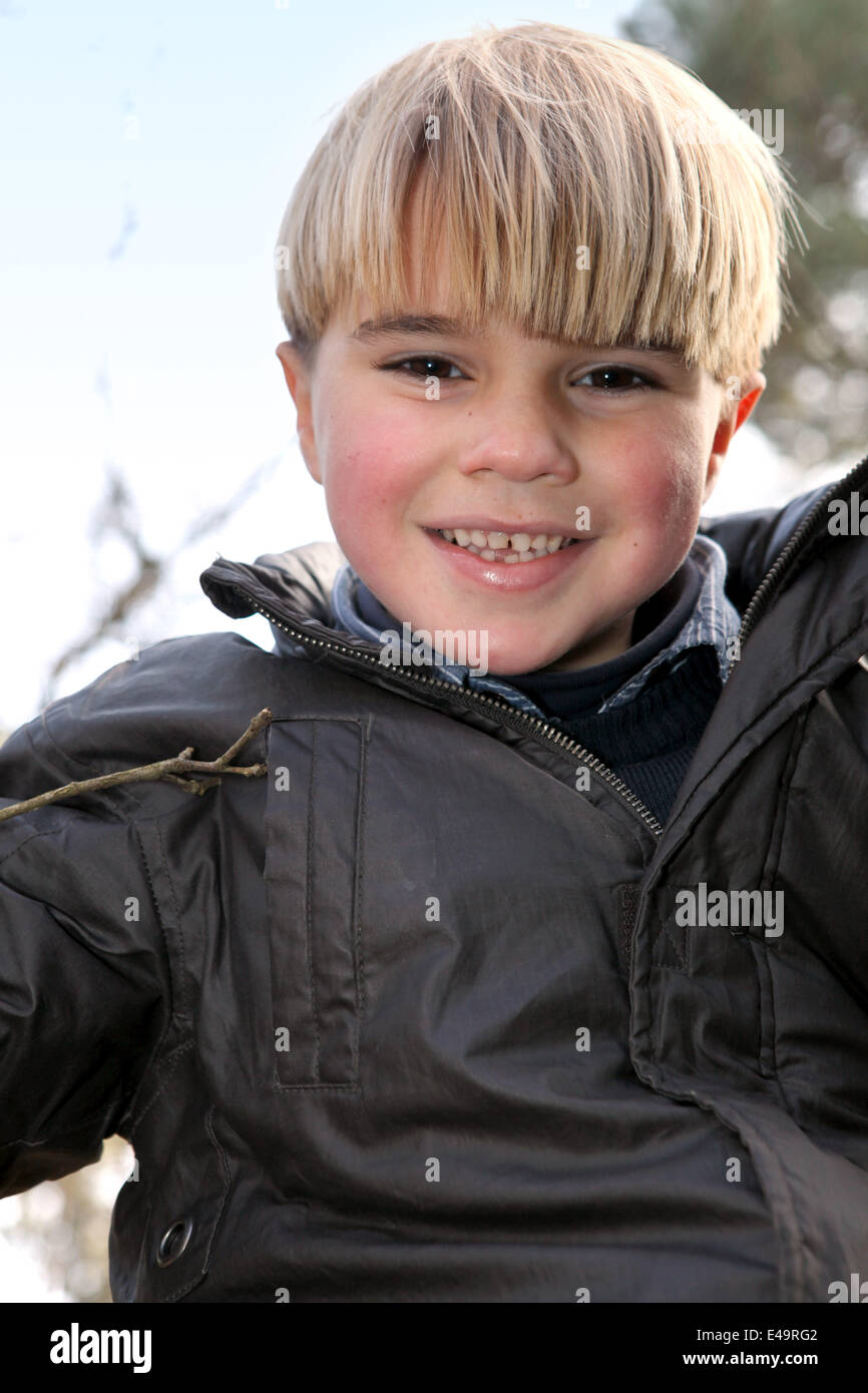 Portrait of a happy little boy outdoors Stock Photo - Alamy