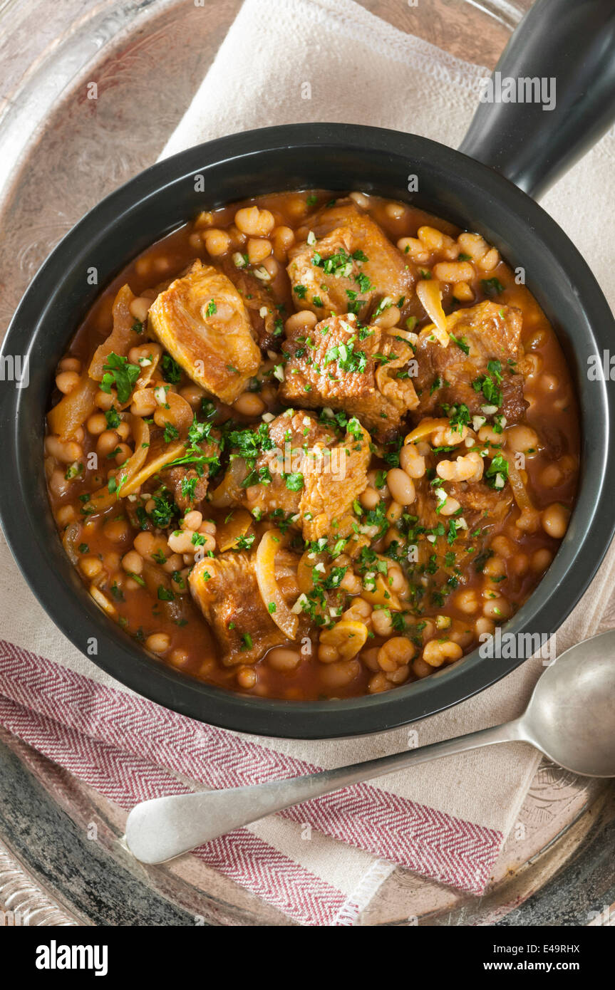 Ragoût d'agneau aux haricots blancs. Lamb stew with white beans Stock