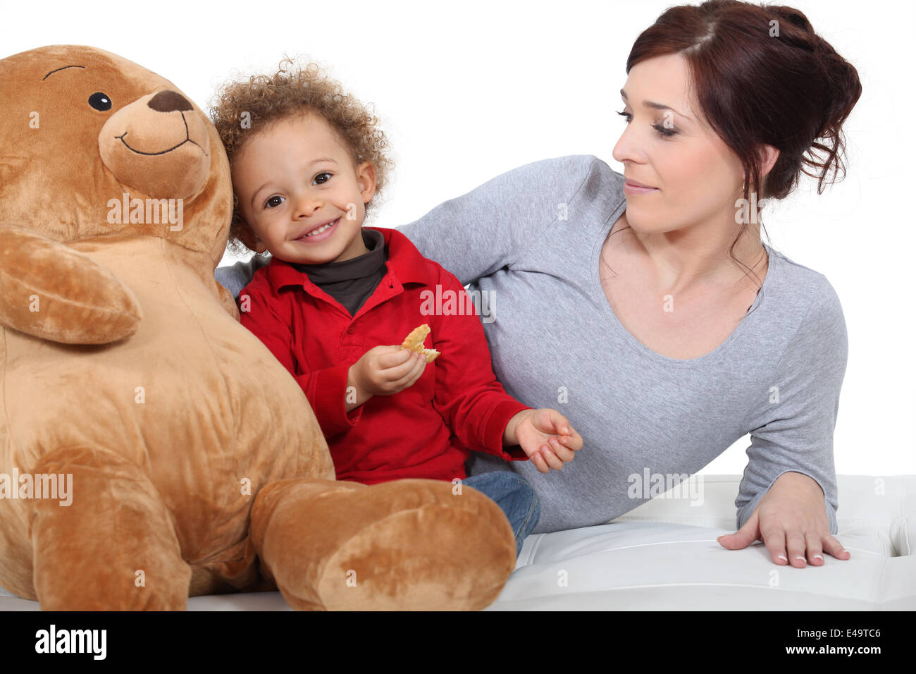 Mother with baby and teddy bear Stock Photo - Alamy
