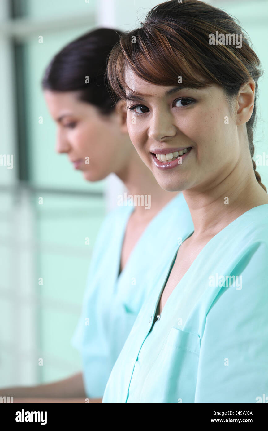 Nurses in scrubs Stock Photo