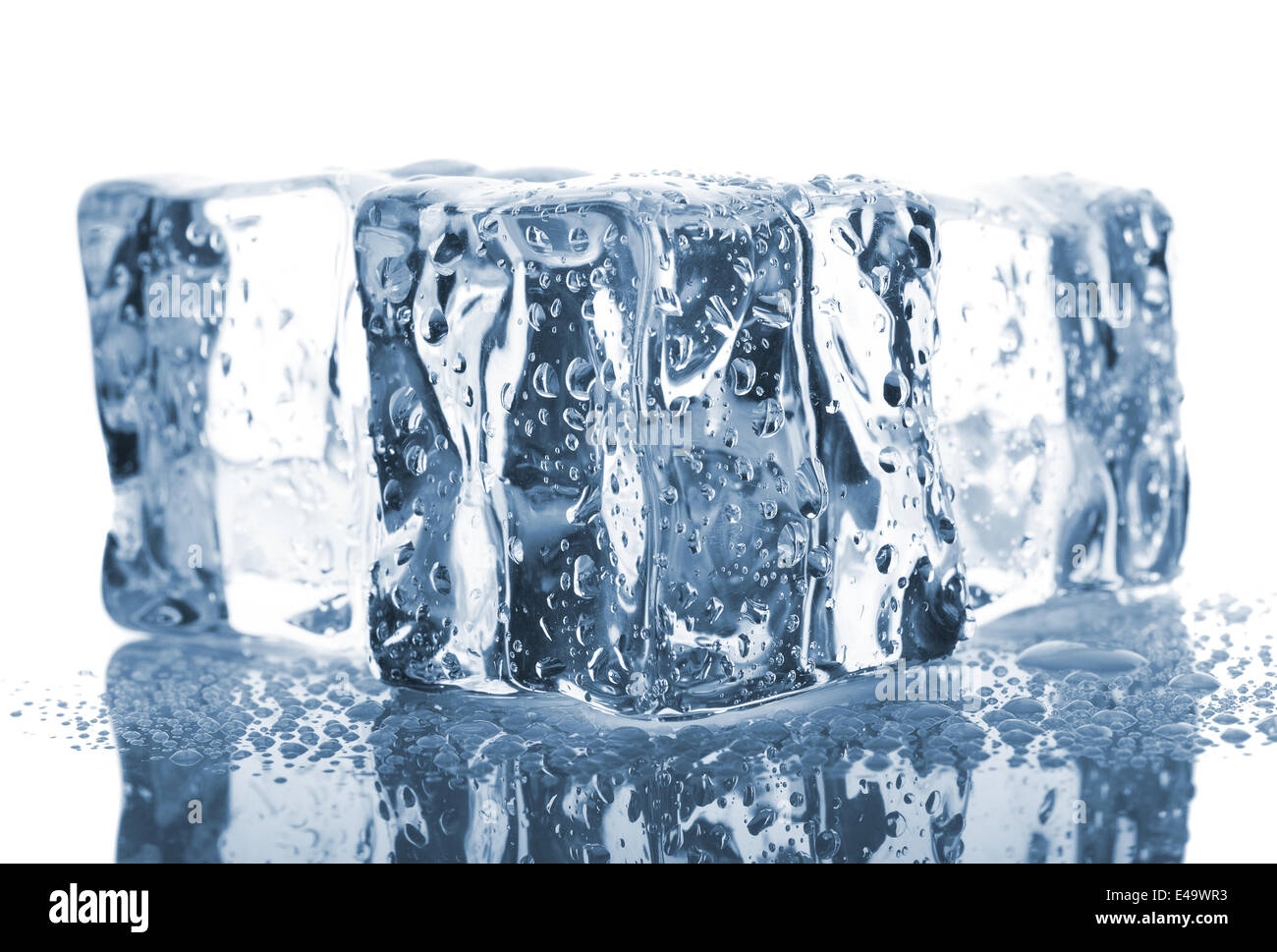 Three ice cubes with water drops Stock Photo - Alamy