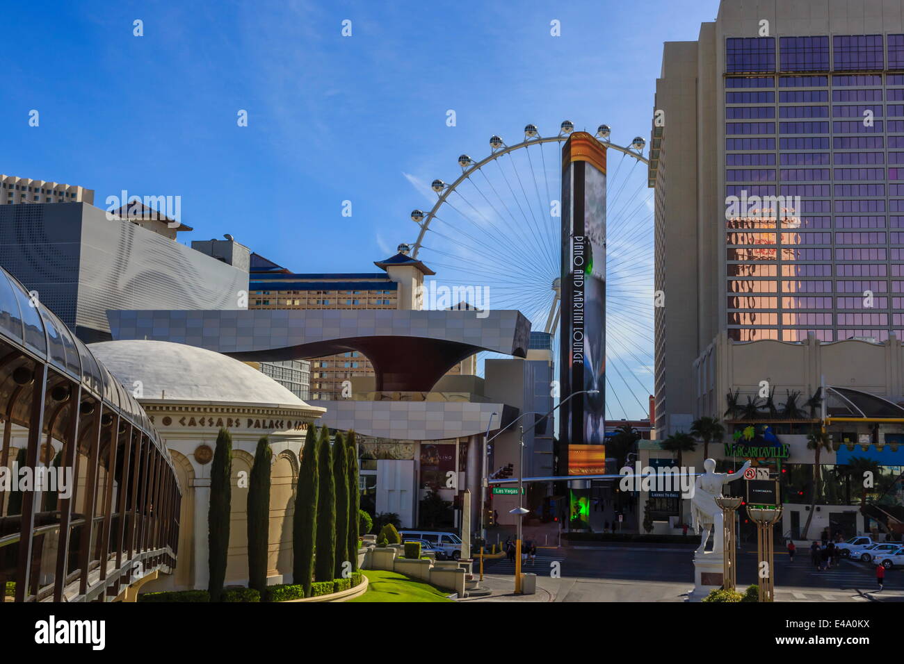 View across The Strip from Caesars, with Caesars walkway and High Roller Observation Wheel, Las Vegas, Nevada, USA Stock Photo