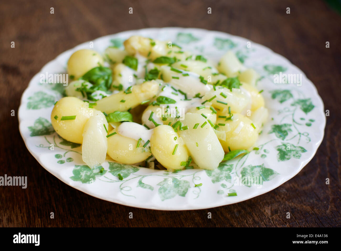Potato salad with asparagus and a soy yogurt dressing Stock Photo Alamy
