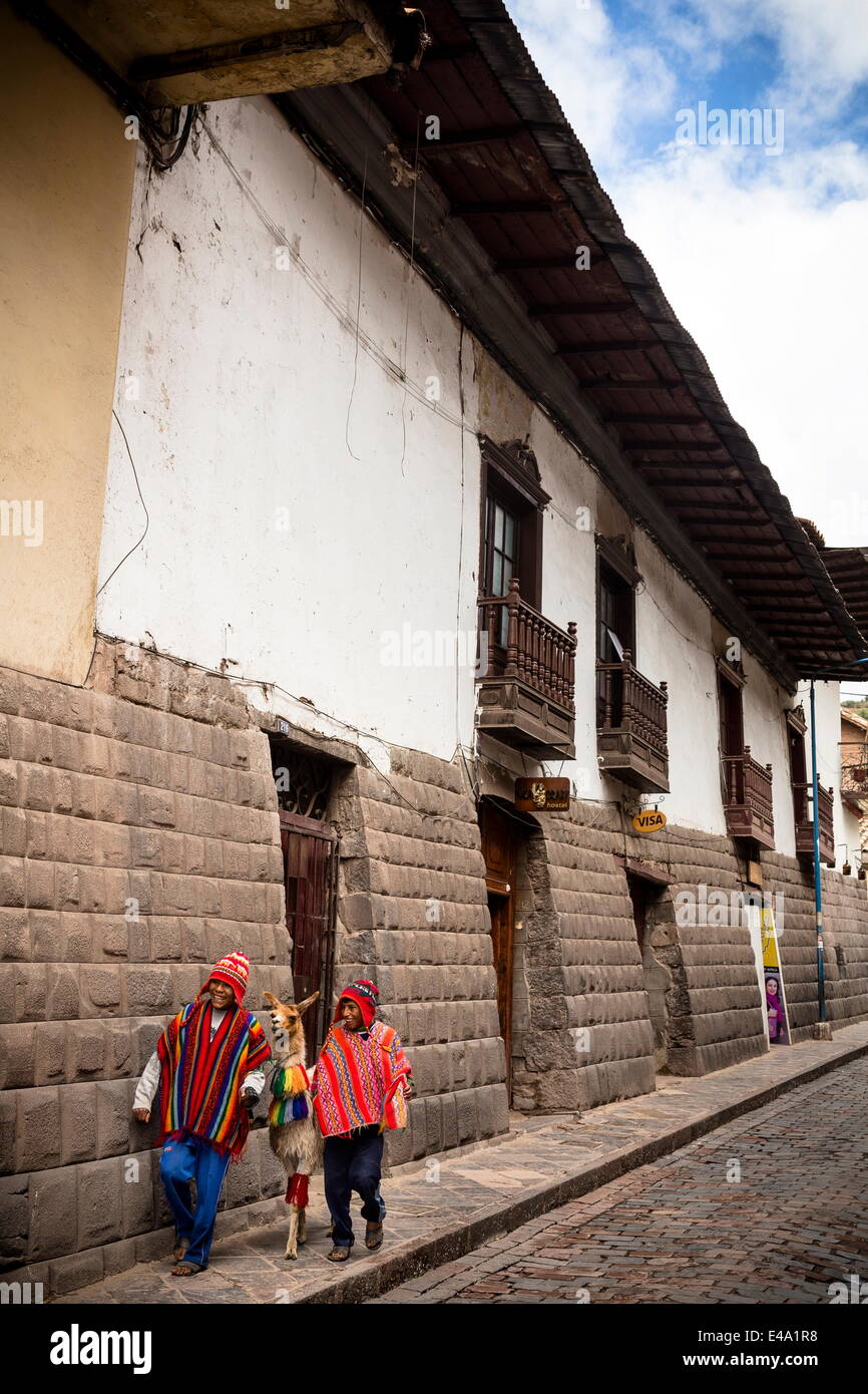 Tupacos wall with its gray andesite blocks on San Agustin street, Cuzco, UNESCO World Heritage Site, Peru, South America Stock Photo