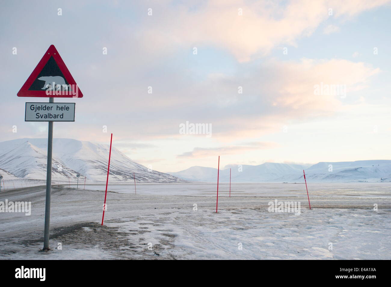 At the edge of the settlement signs warn visitors and tourists of the danger of polar bears, Svalbard, Arctic, Norway Stock Photo