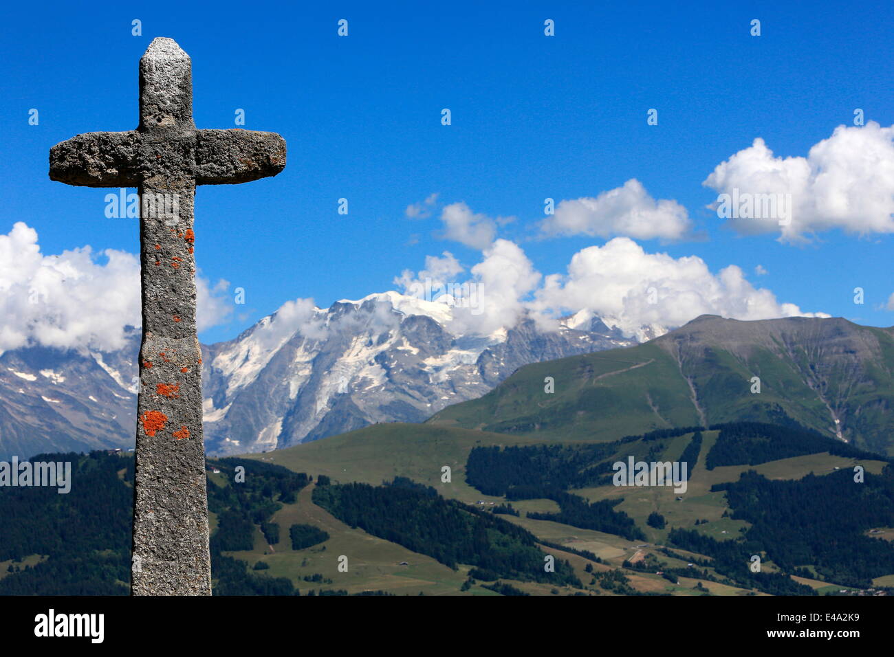 Stone cross on the Jaillet facing Mont Blanc, Megeve, Haute-Savoie, France, Europe Stock Photo