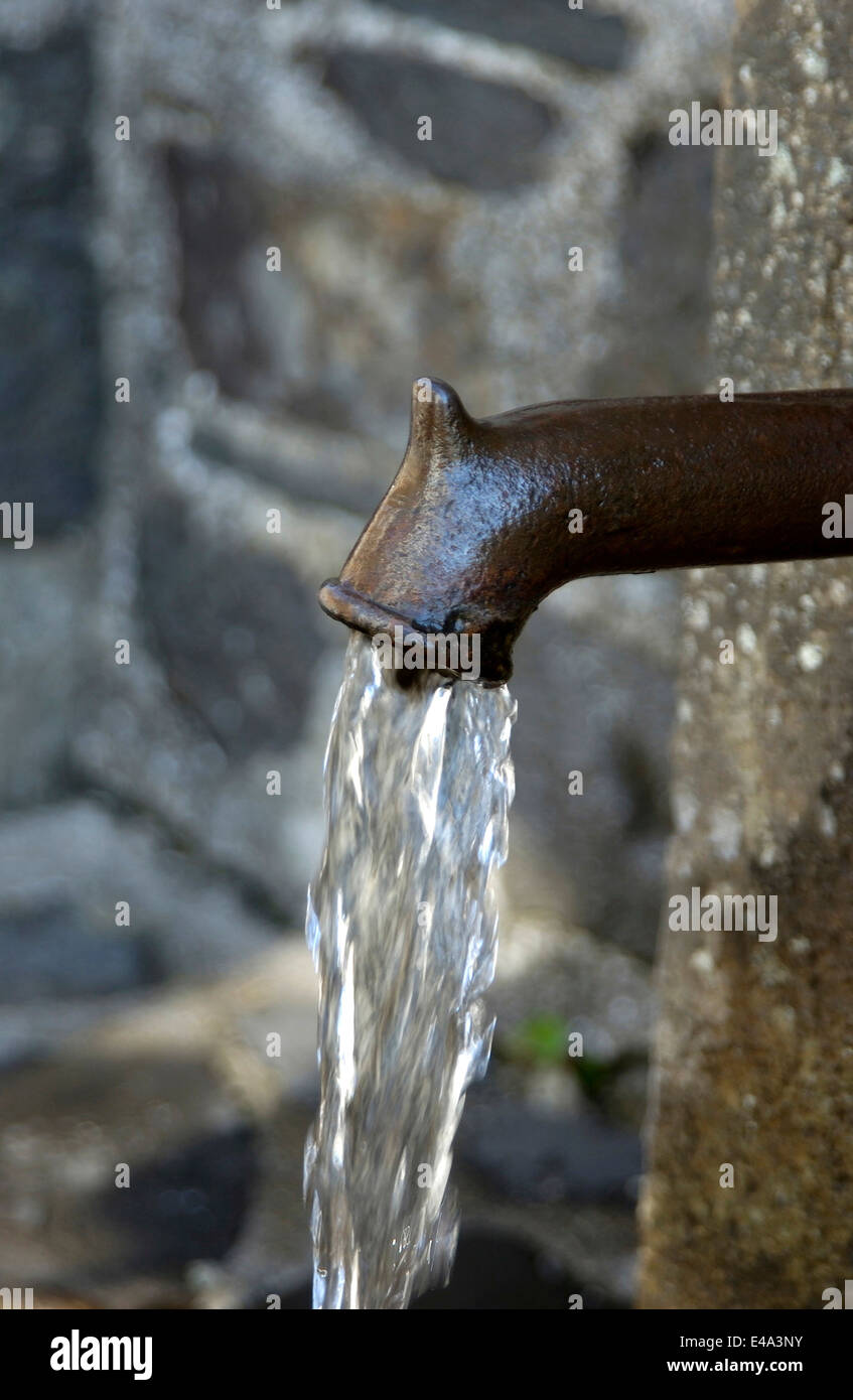 Spring water flowing from an outdoor tap Stock Photo Alamy