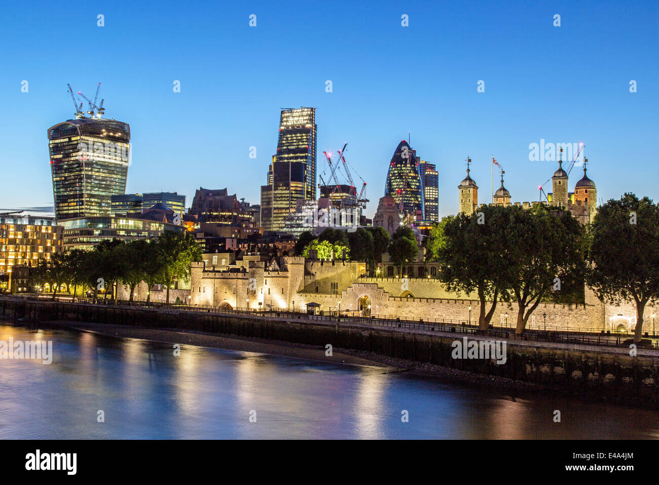 Tower Of London and the City  at Night London UK Stock Photo