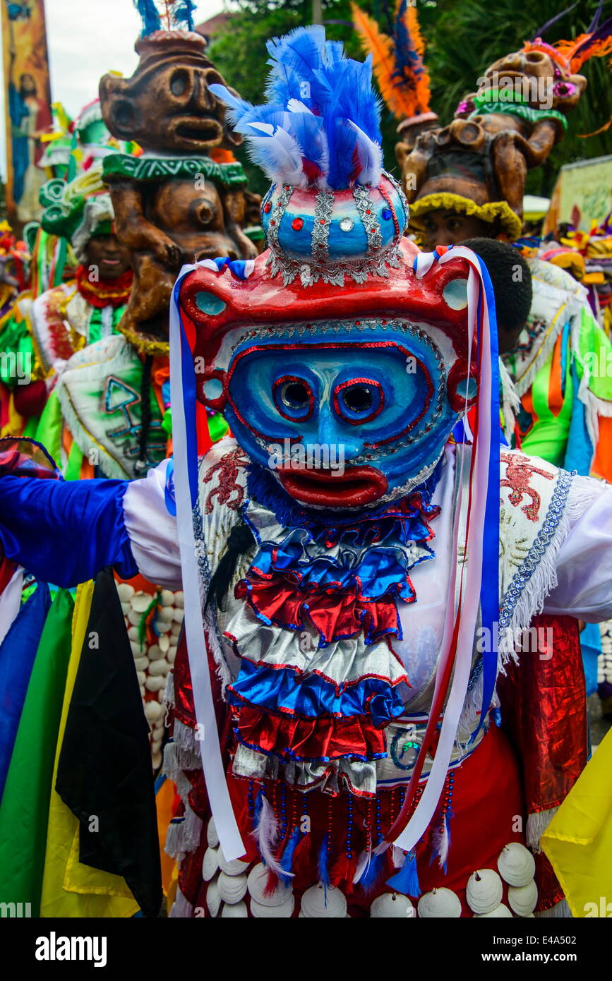 Colourful dressed masked man in the Carneval (Carnival) in Santo Domingo, Dominican Republic, West Indies, Caribbean Stock Photo