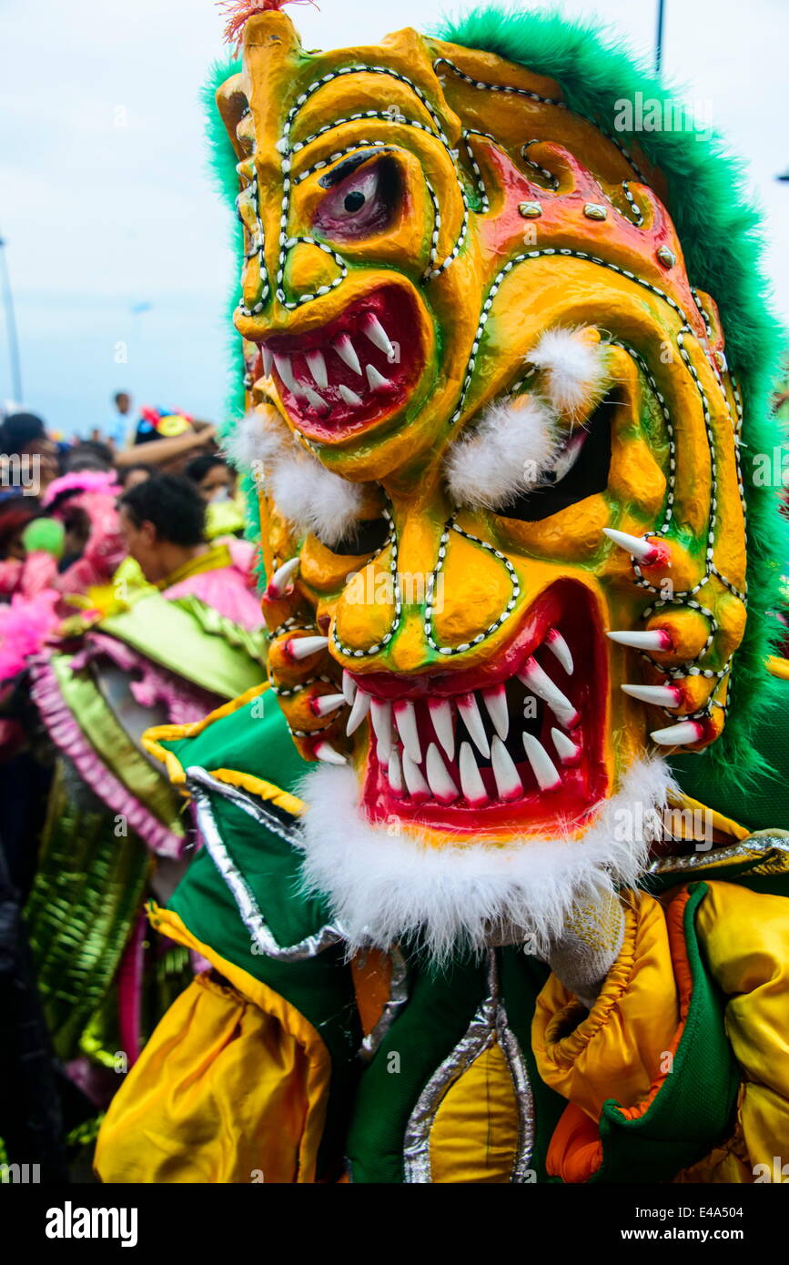 Colourful dressed masked man in the Carneval (Carnival) in Santo Domingo, Dominican Republic, West Indies, Caribbean Stock Photo