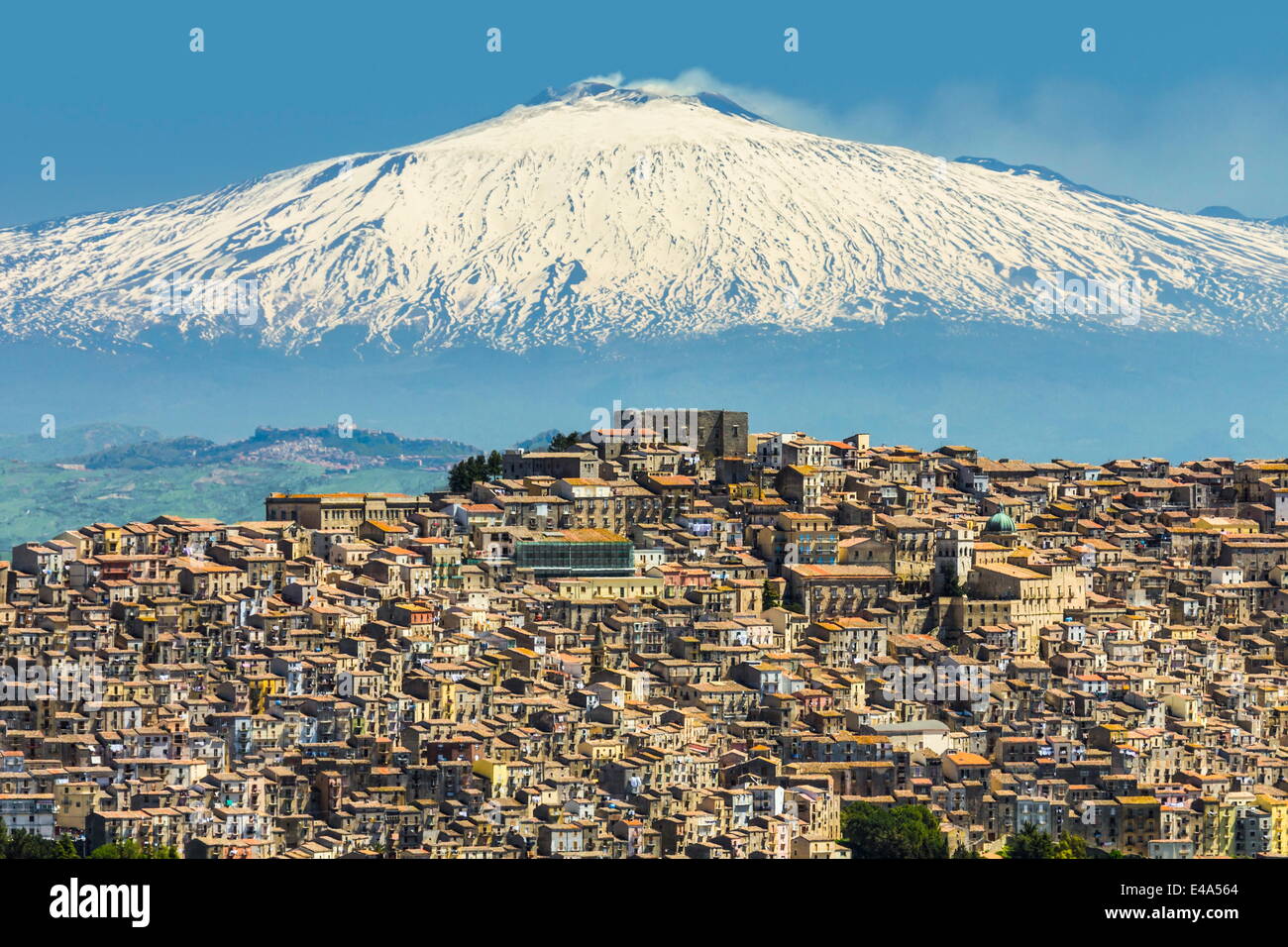 Hill town with backdrop of snowy volcano Mount Etna, Gangi, Palermo
