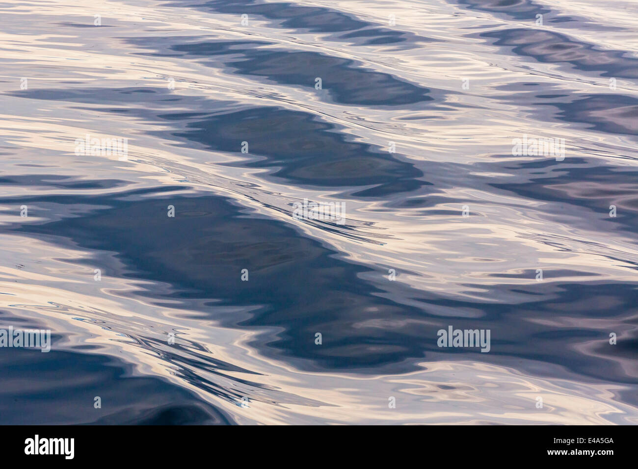 Reflections from ships wake in the sea near the town of Ilulissat, Greenland, Polar Regions Stock Photo