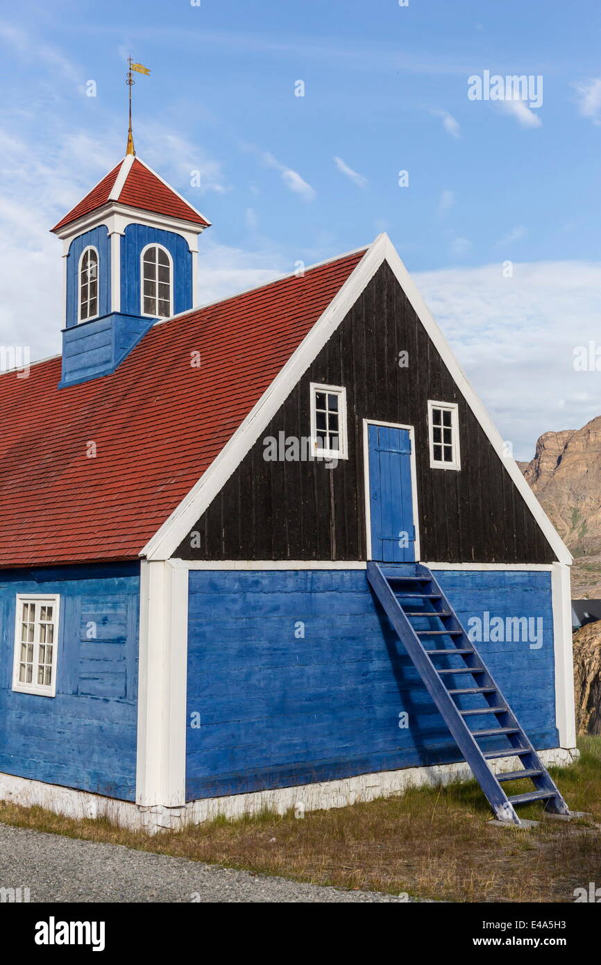 Brightly painted house with ladder to upstairs storage in Sisimiut, Greenland, Polar Regions Stock Photo