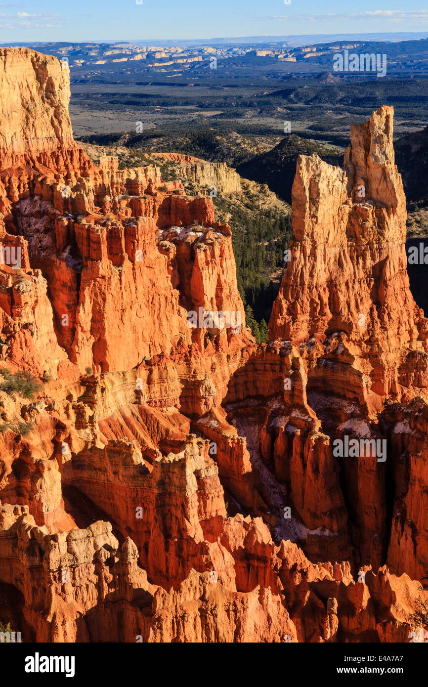 Hoodoos lit by late afternoon sun with distant view in winter, Paria View, Bryce Canyon National Park, Utah, USA Stock Photo