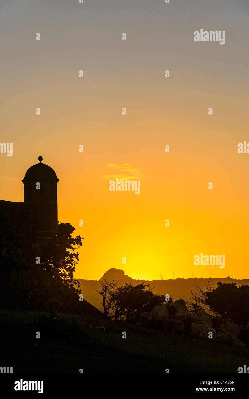 Backlit watchtower of the Fortress of Fortaleza San Felipe, Puerto Plata, Dominican Republic, West Indies, Caribbean Stock Photo