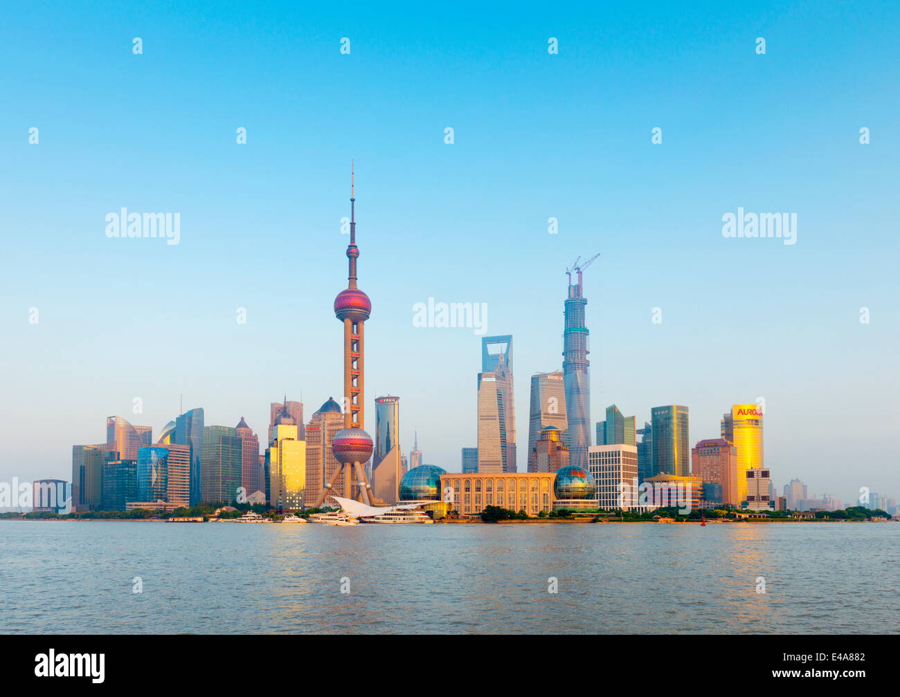 China, Shanghai, Pudong Skyline across Huangpu River, Oriental Pearl Tower, Shanghai World Financial Center, Shanghai Tower Stock Photo
