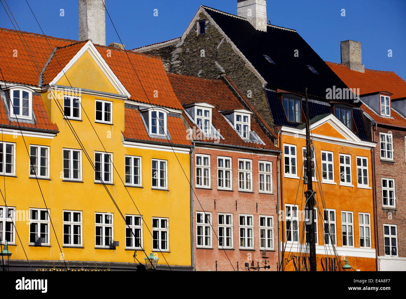 Old buildings in famous Nyhavn harbour area of Copenhagen, Denmark, Scandinavia, Europe Stock Photo